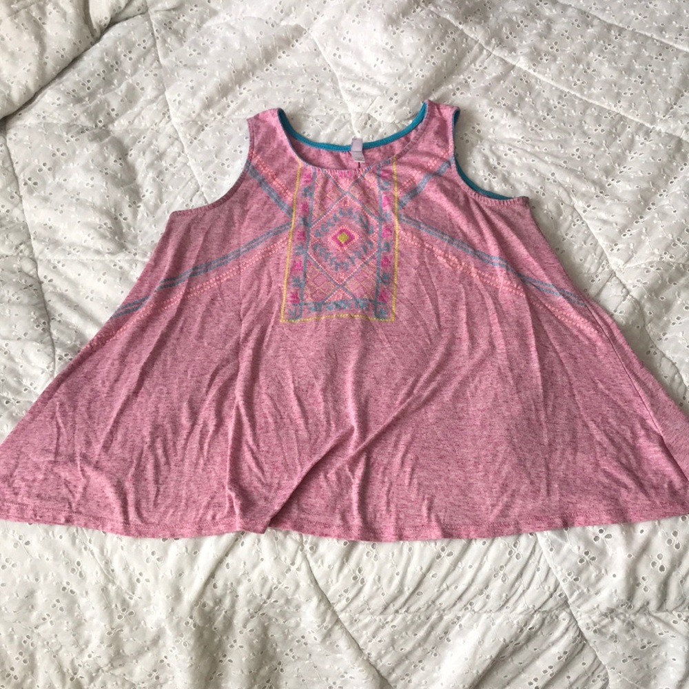 pink tank top with designs